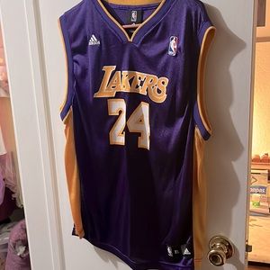 Purple & yellow #24 Kobe Bryant women’s jersey only used once